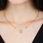 Collana in acciaio Gold con cuore e perle bianche