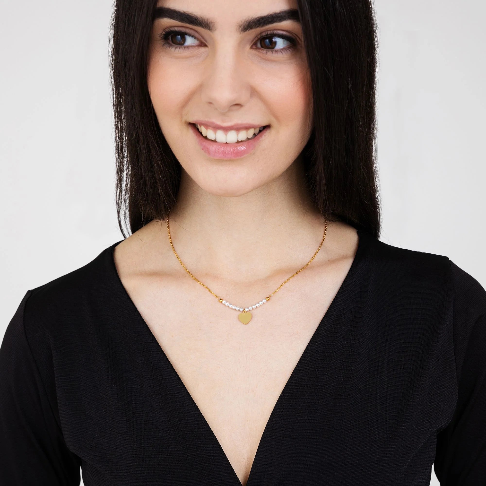 Collana in acciaio Gold con cuore e perle bianche