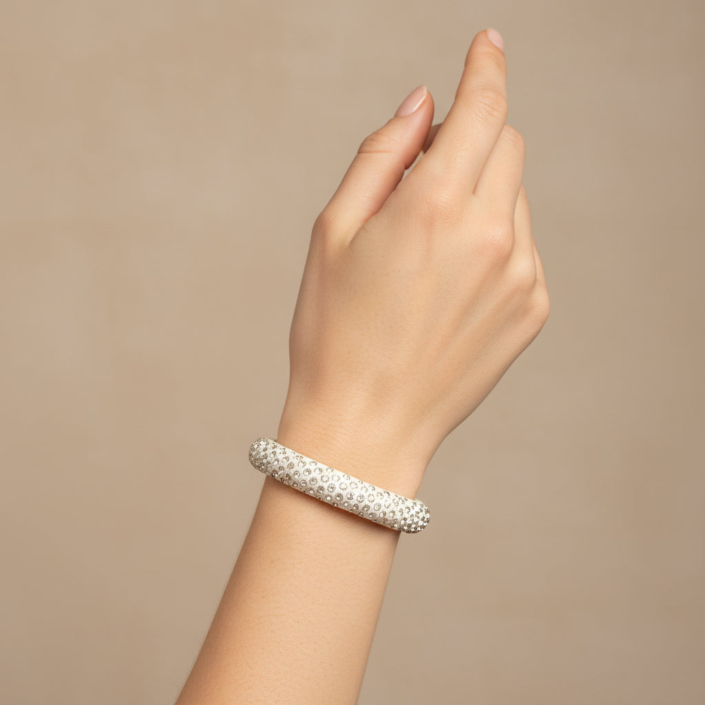Bracciale rigido con cristalli luminosi